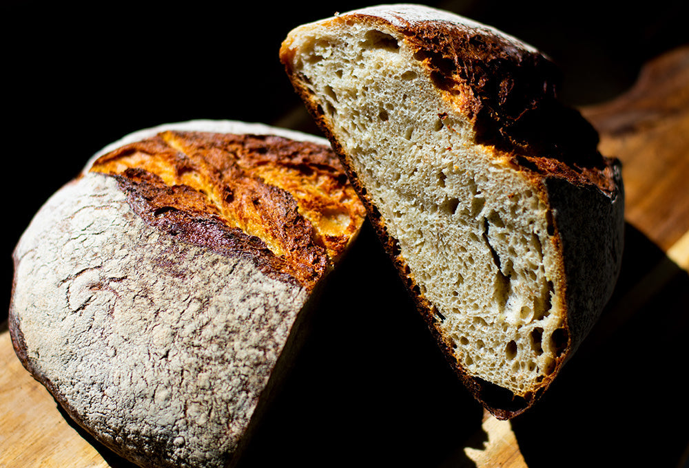 Fresh bread on table representing daily provision