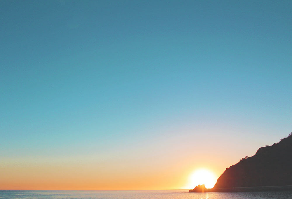 Sunrise over the sea, Peaceful devotional scene representing freedom through the Holy Spirit