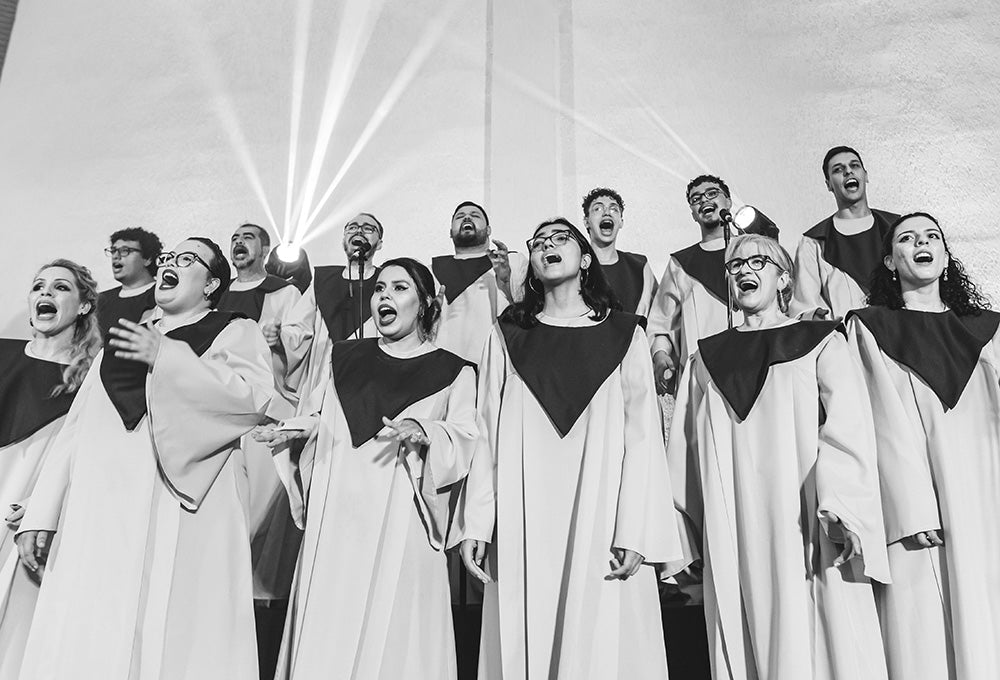 A choir singing their praise to God