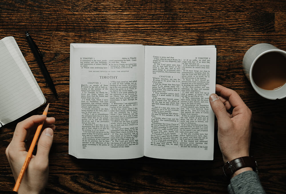 Writing reflections about spiritual priorities in a personalized scripture journal