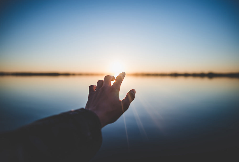 Sunset over landscape symbolizing hope after hardship