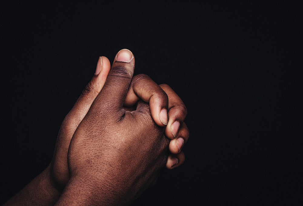 Hands in prayer replacing worry