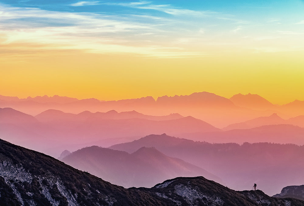 Sunrise over mountains symbolizing peace and guidance