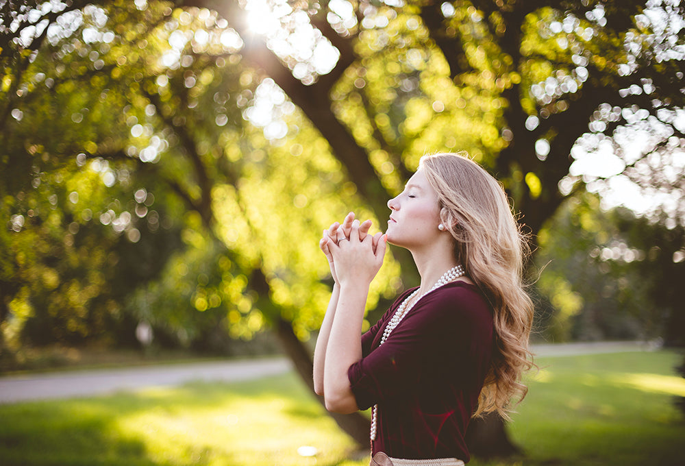 Woman praying quietly during personal devotion time