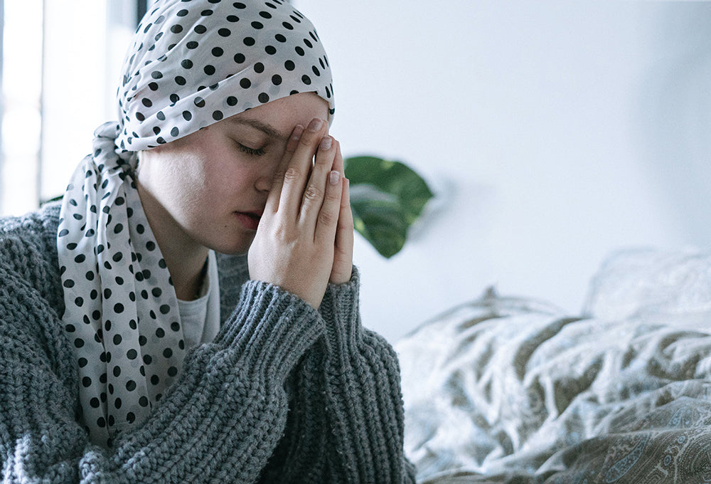 Woman praying alone in quiet reflection