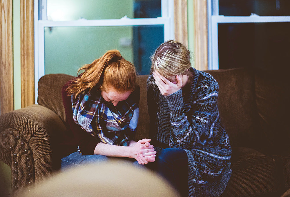 Writing reflections during a season of grief in a personalized scripture journal