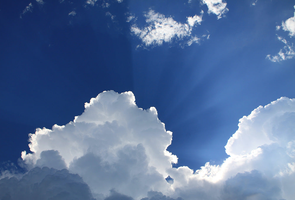 Sunlight breaking through clouds symbolizing hope