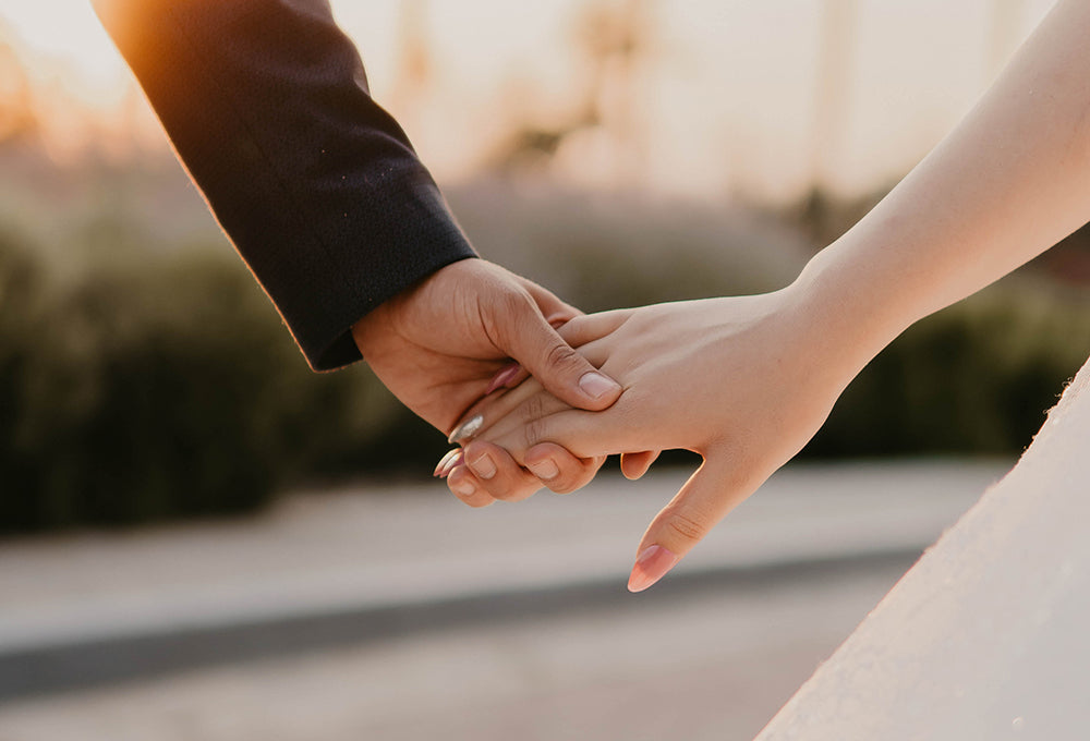 Husband and wife hands showing quiet and gentle strength