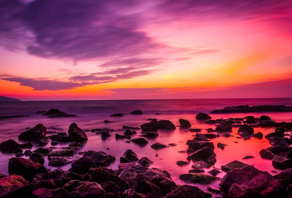 Bold Sunset on a rocky beach