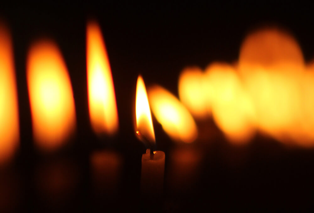 Candle flames in the dark