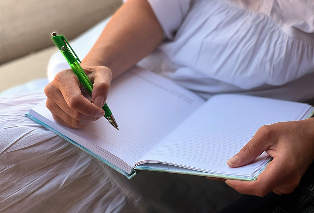 Morning journaling in a personalized scripture journal