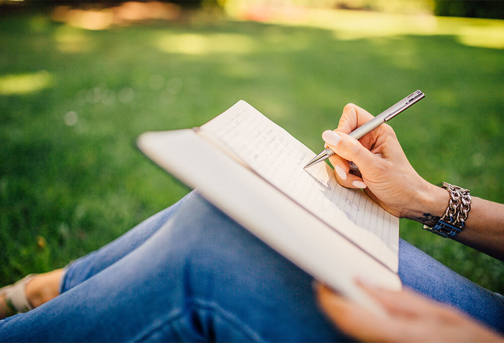 Christian woman journaling