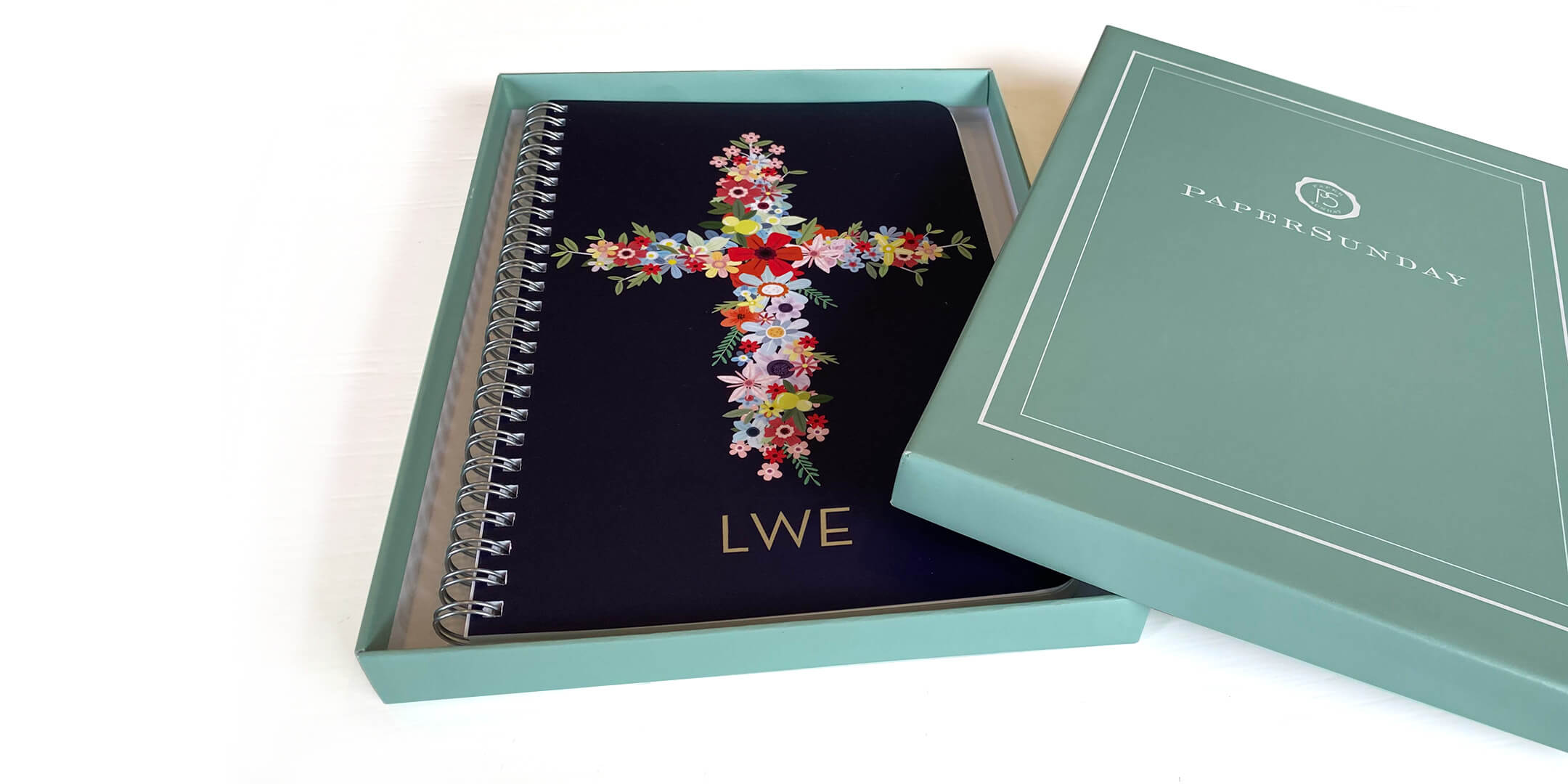 best selling christian journal design sitting in a teal paper sunday gift box