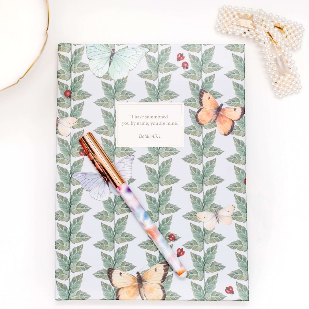 Lydia Carraway designed butterfly personalize scripture journal with a pen representing the art of journaling