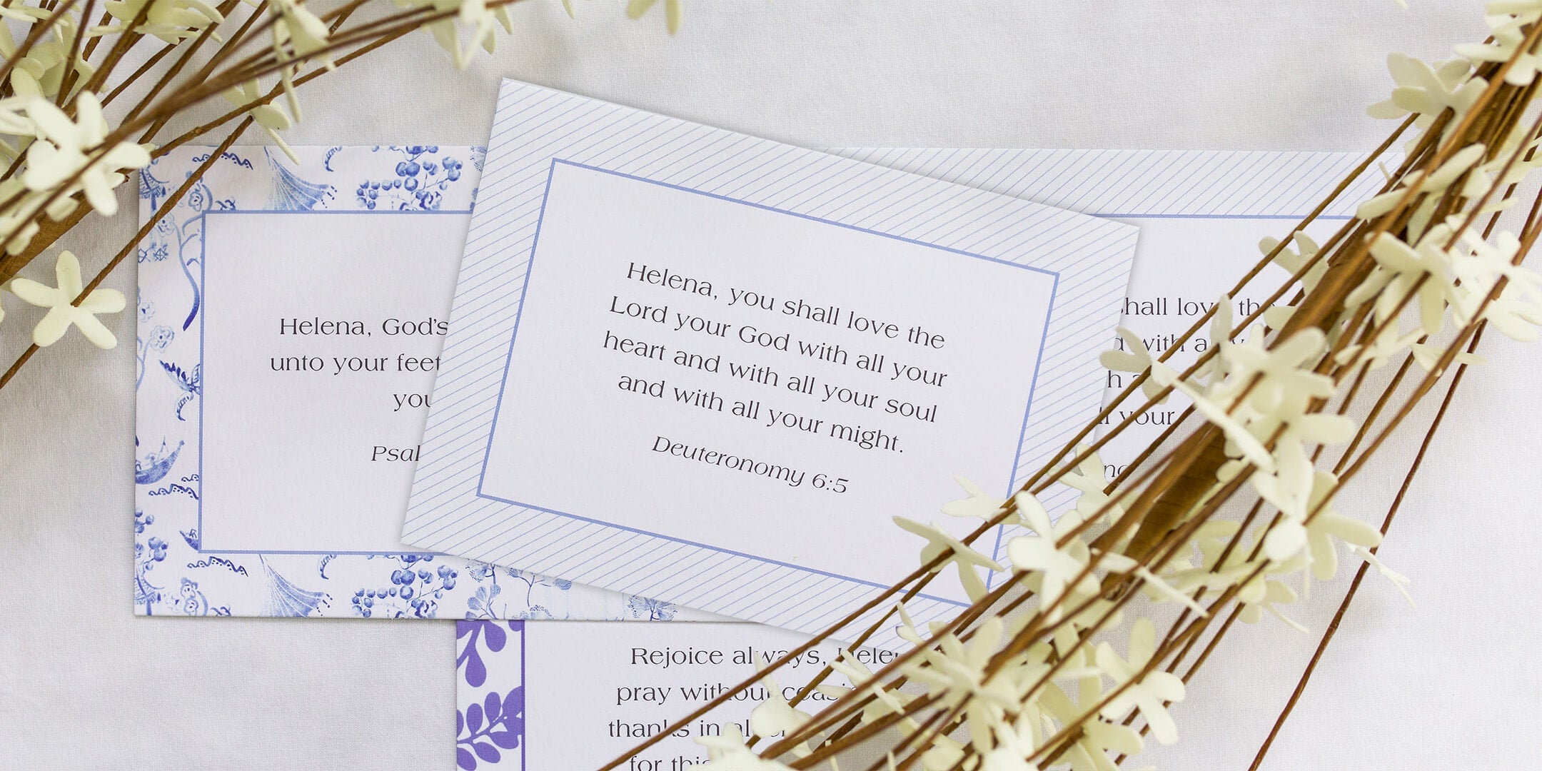 Three bible verse cards nested with wreaths and flowers for a stunning image of God's love