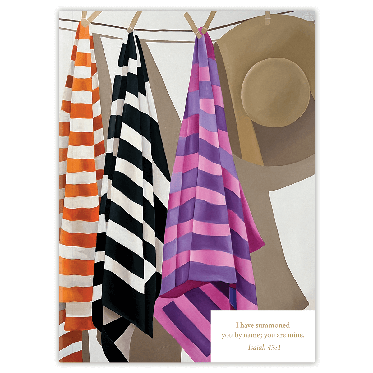 A planner with an abstract pattern design in black, orange, and pink stripes, displayed on a stand with a quote at the bottom.