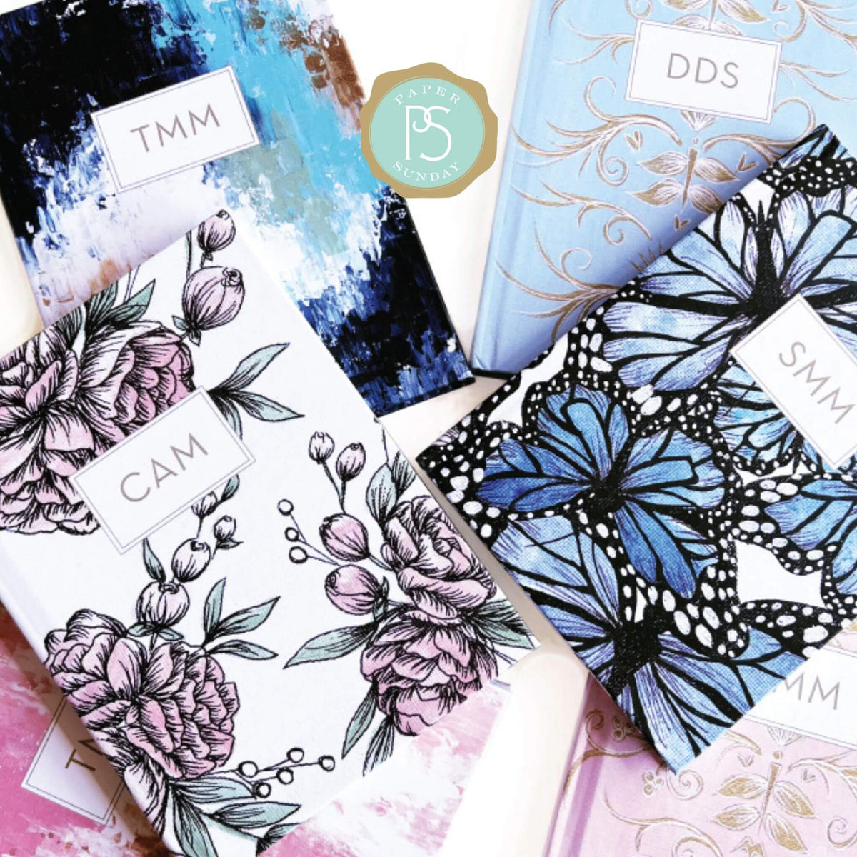Planner covers featuring artwork by Theresa Mangum in Paper Sunday collection