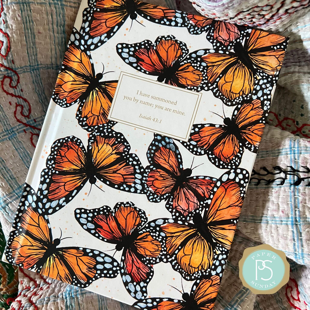 Custom planner with Sharon’s Monarch design by Theresa Mangum and personalized name on flexible soft cover