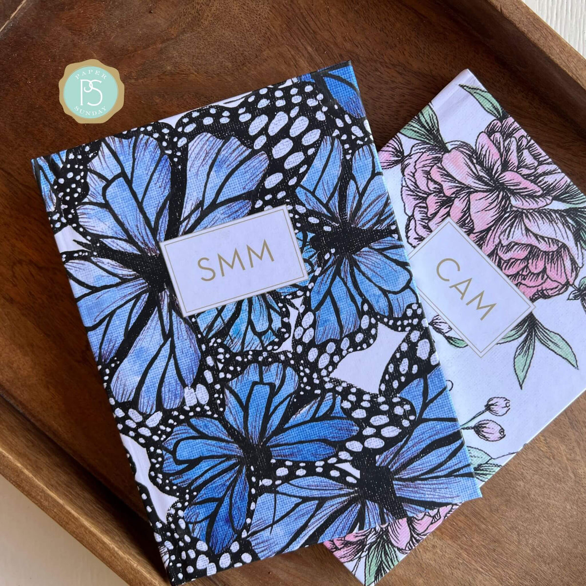 Custom planner with Monarch design by Theresa Mangum and personalized name on flexible soft cover