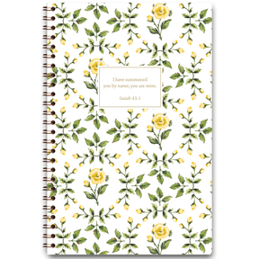 The image displays the cover of a planner titled 'Yellow Roses' designed by Lydia Carraway. The cover features a delicate yellow rose pattern with green leaves on a white background, and includes a framed section for personalization with the text 'Jane –'.