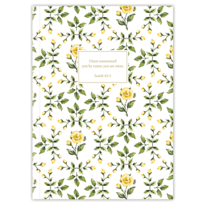 The image displays the cover of a planner titled 'Yellow Roses' designed by Lydia Carraway. The cover features a delicate yellow rose pattern with green leaves on a white background, and includes a framed section for personalization with the text 'Jane –'.